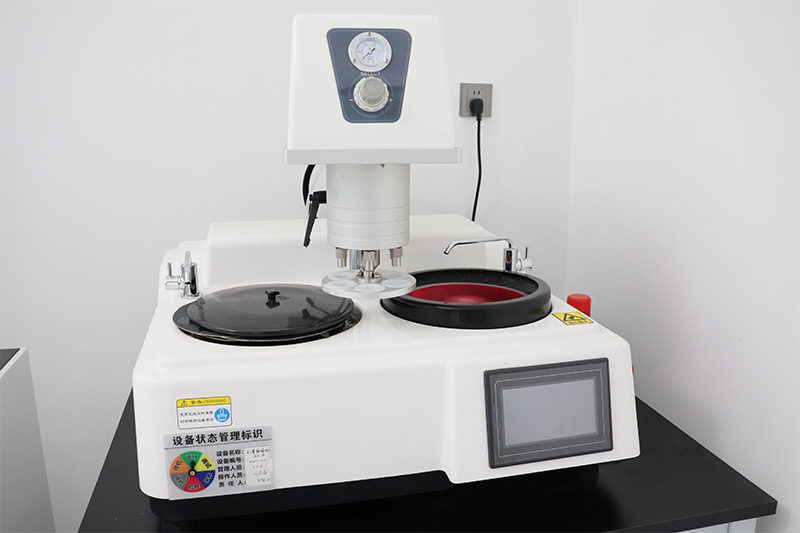 Automatic grinding and polishing machine for metallographic specimens