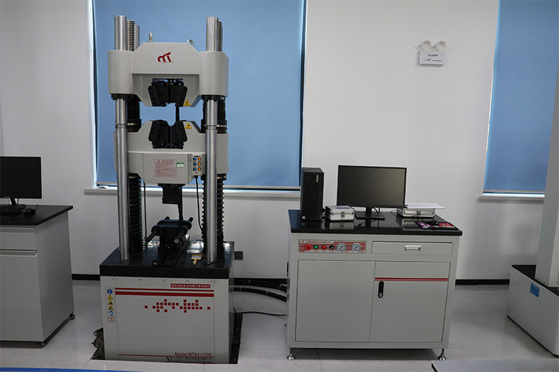 Microcomputer controlled electro-hydraulic servo universal testing machine